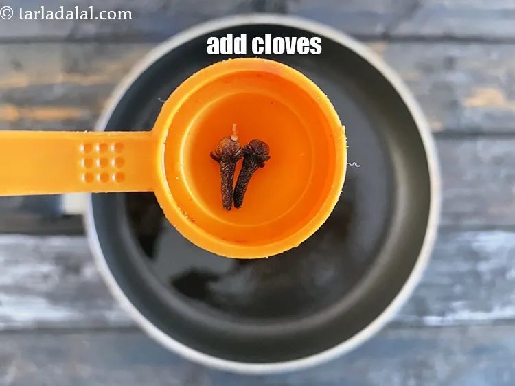 Step 17 – Add&nbsp;<meta charset="UTF-8" />2&nbsp;<a href="glossary-cloves-laung-lavang-322i">cloves (laung / lavang)</a>.