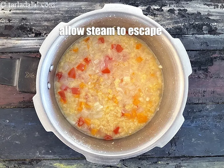 Step 18 – Allow the steam to escape before opening the lid.