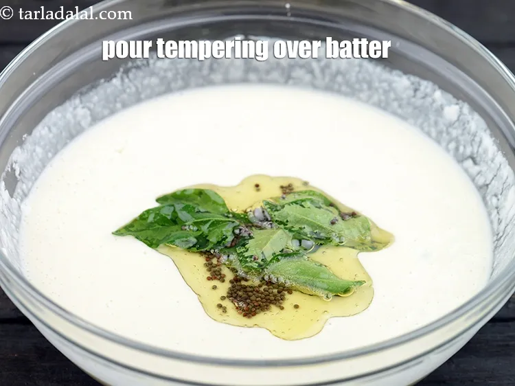 Step 17 – Pour this tempering over the batter.