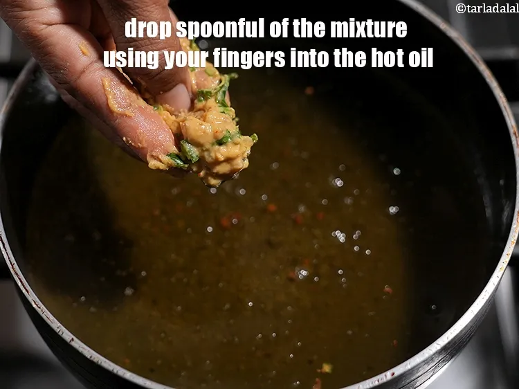 Step 18 – <meta charset="UTF-8" />Drop spoonful of the mixture using your fingers into the hot oil. Be …
