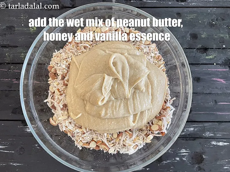 Step 25 – Add the wet mix of peanut butter with honey and vanilla essence.