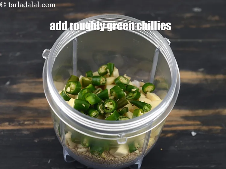 Step 17 – Add 1 tbsp&nbsp;roughly&nbsp;<a href="https://tarladalal.com/glossary-green-chillies-hari-mirch-331i">green chillies</a>.&nbsp;