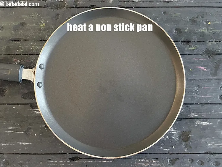 Step 17 – Heat a non-stick tava (griddle).