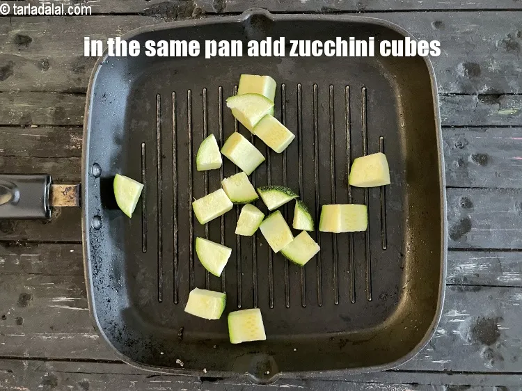 Step 18 – In the same pan, add&nbsp;<meta charset="UTF-8" />1/2 cup&nbsp;<a href="glossary-zucchini-cubes-740i">zucchini cubes</a>.