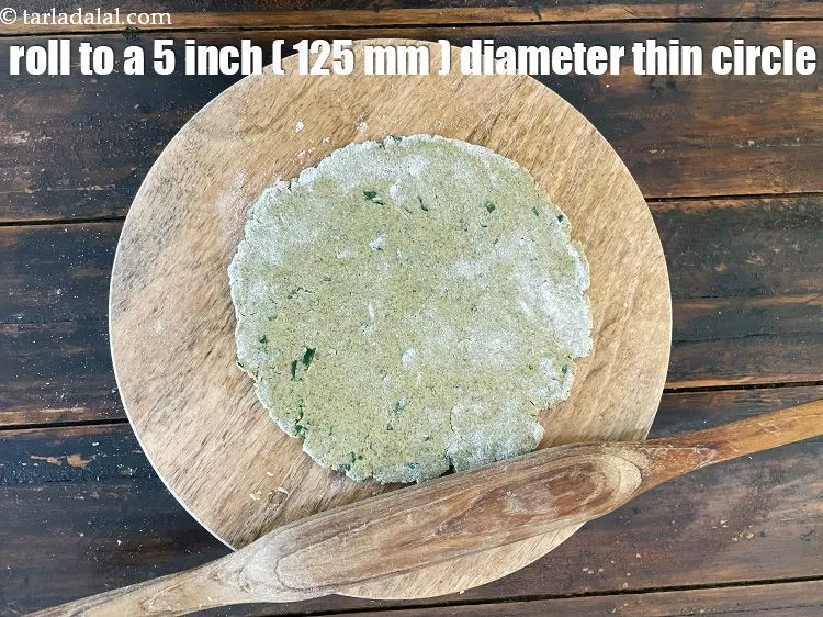 Step 37 – Roll out each portion into a 125 mm. (5&quot;) diameter thin circle.