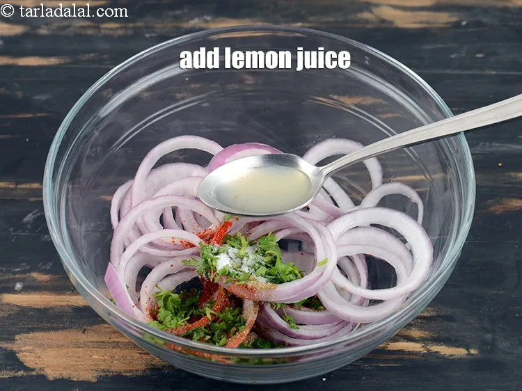 Step 16 – Add 1 tsp <a href="https://www.tarladalal.com/glossary-lemon-juice-numbi-ka-ras-nimbu-ka-juice-471i">lemon juice</a>.