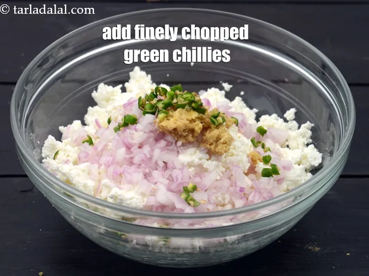 Step 19 – Add 2 tsp finely&nbsp;<a href="https://www.tarladalal.com/glossary-chopped-green-chilli-820i">chopped green chillies</a>.