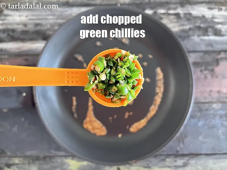Step 19 – Add&nbsp;<meta charset="UTF-8" />2 tsp&nbsp;finely&nbsp;<a href="glossary-chopped-green-chilli-820i">chopped green chillies</a>.