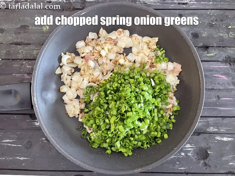 Step 19 – Add&nbsp;<meta charset="UTF-8" />2 cups&nbsp;<a href="glossary-chopped-spring-onion-greens-1030i">chopped spring onion greens</a>.