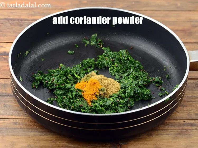 Step 18 – Add 1 tsp&nbsp;<a href="https://www.tarladalal.com/glossary-coriander-powder-dhania-powder-370i">coriander (dhania) powder</a>.