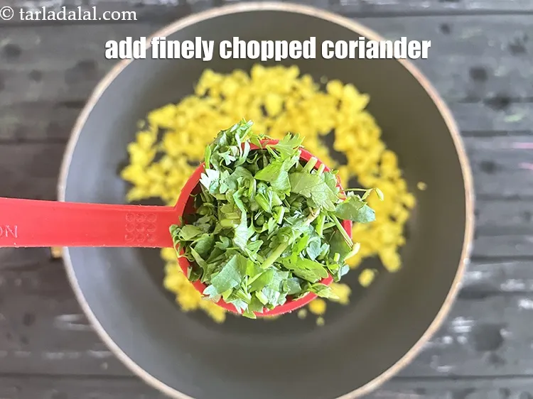 Step 18 – Add 3&nbsp;tbsp&nbsp;finely&nbsp;<a href="glossary-chopped-coriander-783i">chopped coriander (dhania)</a>.