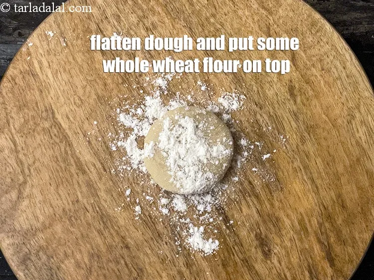 Step 26 – Flatten dough and put some whole wheat flour on top.