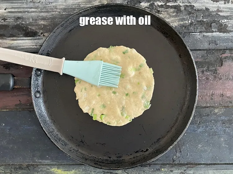 Step 20 – Grease paratha with oil.