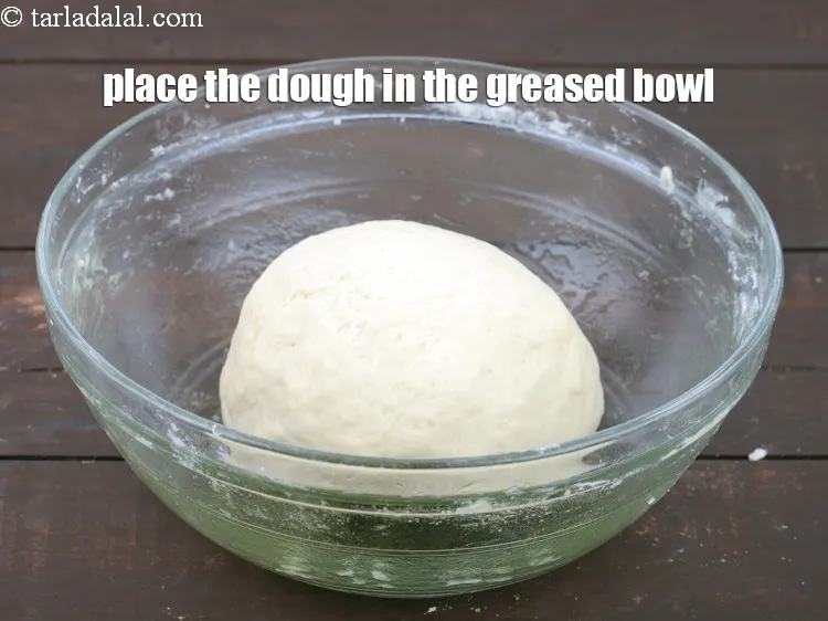 Step 17 – Place the dough in the greased bowl.