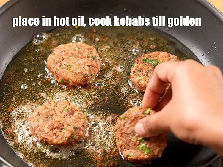 Step 21 – Place it immediately on the hot oil. Cook the kebabs, on a medium flame, till …