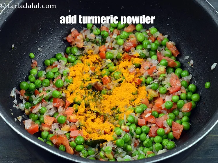 Step 17 – Add 1 1/4 tsp <a href="https://www.tarladalal.com/glossary-turmeric-powder-haldi-645i">turmeric powder (haldi)</a>.&nbsp;