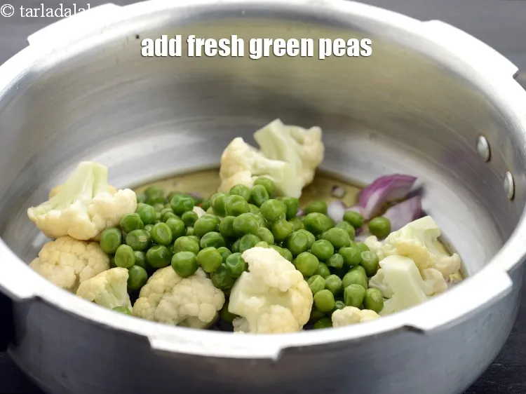 Step 22 – Add 1/2 cup&nbsp;fresh&nbsp;<a href="https://www.tarladalal.com/glossary-green-peas-matar-hare-matar-vatana-180i">green peas</a>.