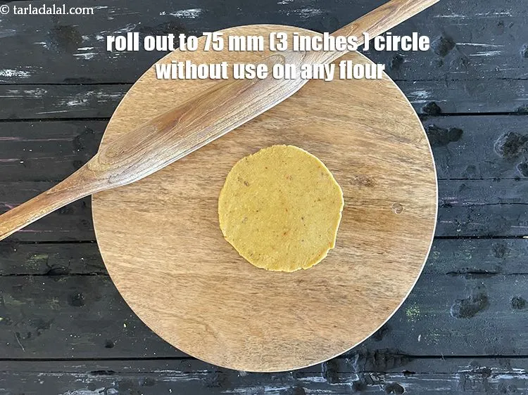 Step 18 – <meta charset="UTF-8" />Roll a portion of the dough into a 75 mm. (3&rdquo;) diameter thin …