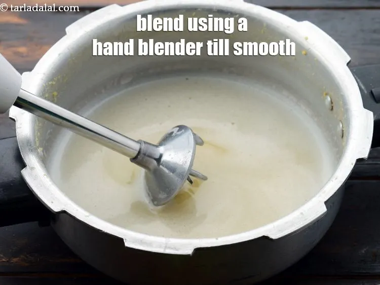 Step 22 – Blend the dal mixture using a hand blender till smooth.