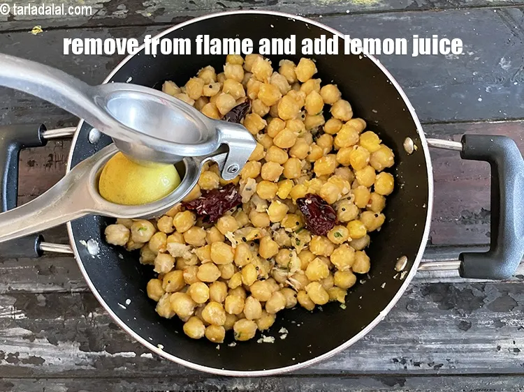Step 28 – Remove from the flame, add <strong>1 tsp lemon juice.</strong>
