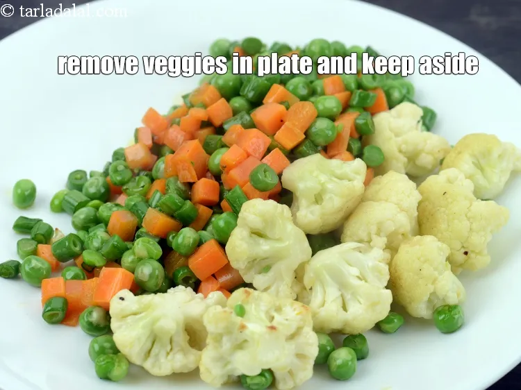 Step 18 – Remove the veggies in a plate and keep aside.&nbsp;