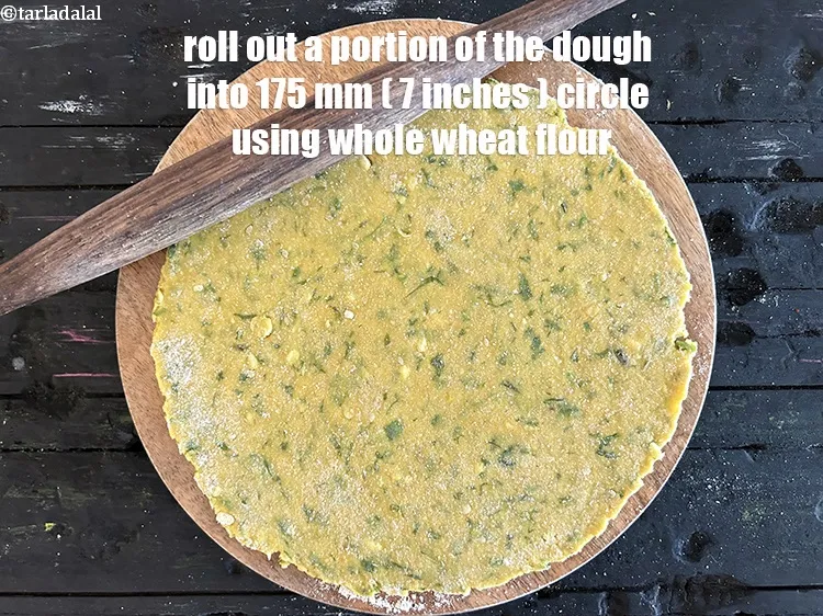 Step 26 – <meta charset="UTF-8" /> Roll a portion of the dough into a 175&nbsp;mm. (7&rdquo;) diameter thin …