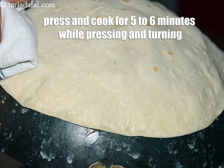 Step 18 – Press and cook on medium&nbsp;flame for 5 to 6 minutes while pressing and turning all …