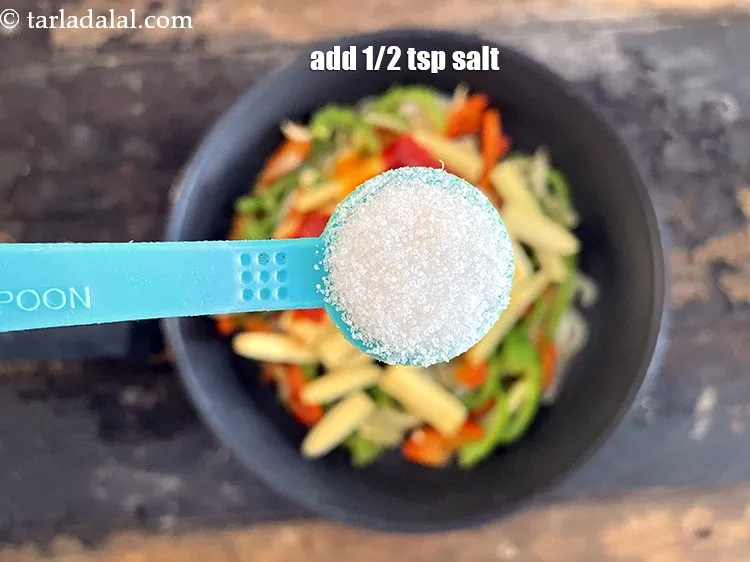 स्टेप 17 – स्वादानुसार नमक डालें। हमने १/२ टी-स्पून नमक डाला है।