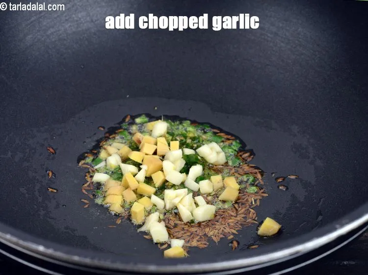 Step 17 – Add 1 tsp&nbsp;<a href="https://www.tarladalal.com/glossary-chopped-garlic-790i">chopped</a> <a href="https://www.tarladalal.com/glossary-chopped-garlic-790i">garlic</a>.