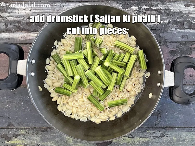 Step 22 – Add&nbsp;<meta charset="UTF-8" />3/4 cup&nbsp;<a href="glossary-drumstick-saijan-ki-phalli-395i">drumstick (saijan ki phalli / saragavo)</a>, cut into 1&rdquo; pieces.