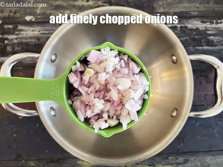 Step 26 – Add&nbsp;1/2 cup&nbsp;finely&nbsp;<a href="glossary-chopped-onions-722i">chopped onions</a>.