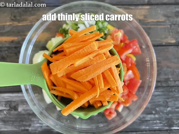 Step 19 – Add&nbsp;<meta charset="UTF-8" />1/2 cup&nbsp;thinly&nbsp;<a href="glossary-sliced-carrots-748i">sliced carrots</a>.