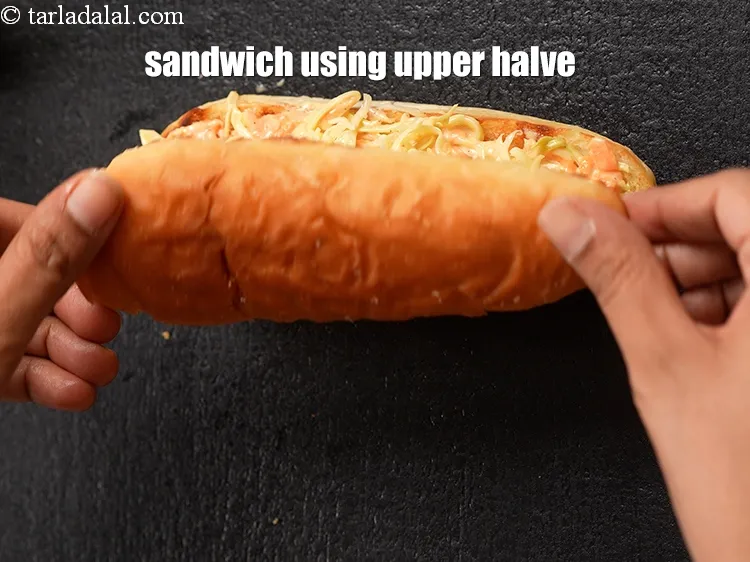 Step 17 – Sandwich it using the upper halve of the hot dog roll.