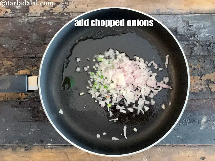 Step 30 – Add&nbsp;<meta charset="UTF-8" />1/2 cup&nbsp;finely&nbsp;<a href="glossary-chopped-onions-722i">chopped onions</a>.