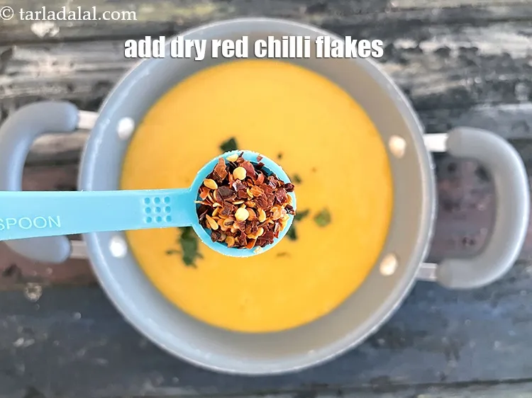 Step 22 – Add&nbsp;<meta charset="UTF-8" />1/2 tsp&nbsp;<a href="glossary-dry-red-chilli-flakes-paprika-338i">dry red chilli flakes (paprika)</a>.