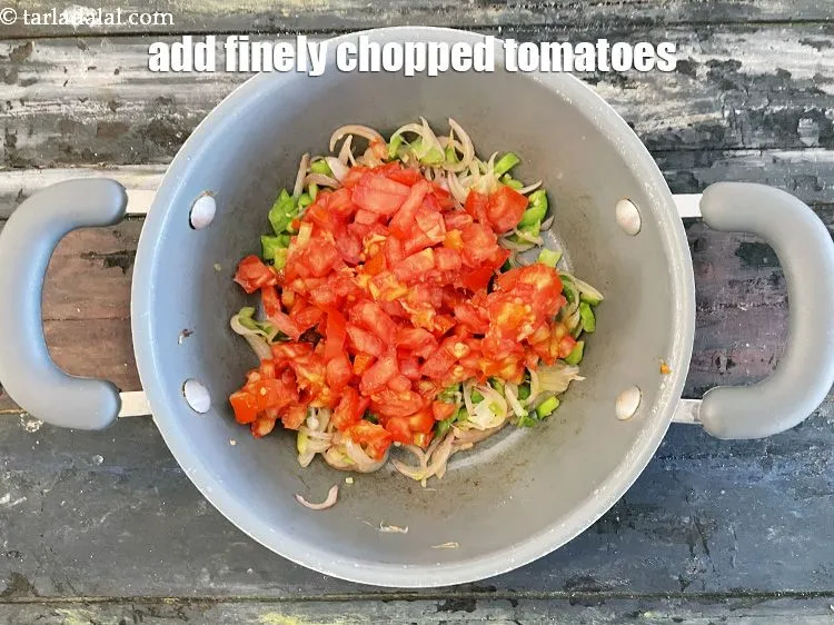 Step 25 – <p>Add&nbsp;1 cup&nbsp;finely&nbsp;<a href="glossary-chopped-tomatoes-779i">chopped tomatoes</a>.</p>