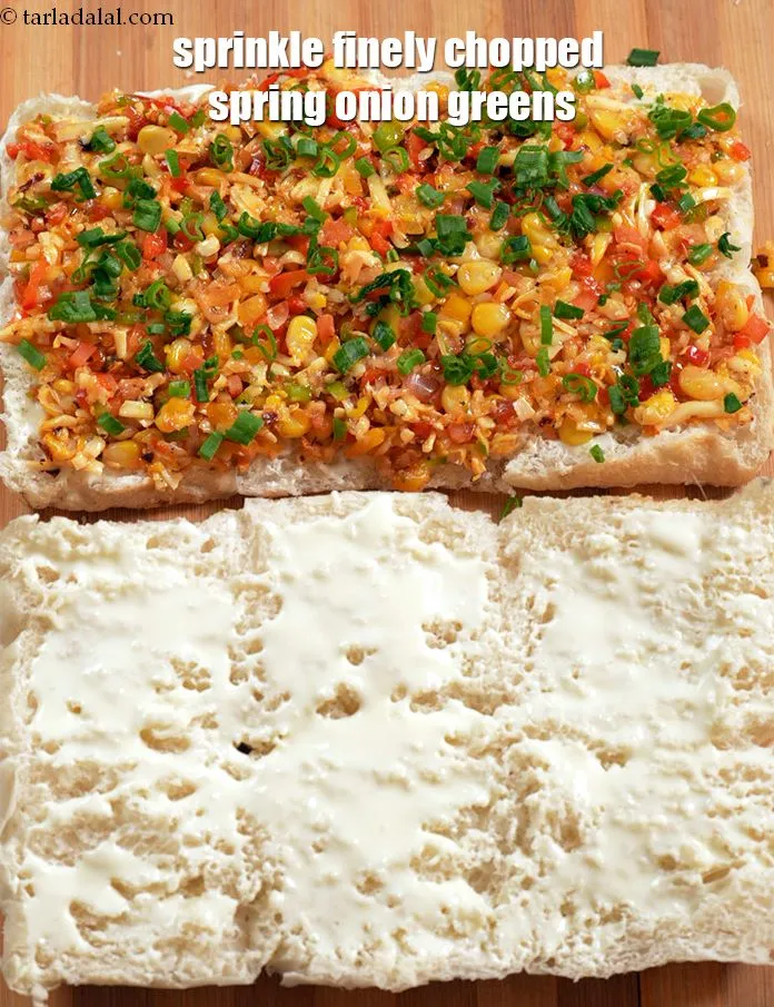Step 18 – Finally sprinkle 1 tbsp of finely&nbsp;<a href="https://www.tarladalal.com/glossary-chopped-spring-onion-greens-1030i">chopped spring onion greens</a>evenly over it.&nbsp;