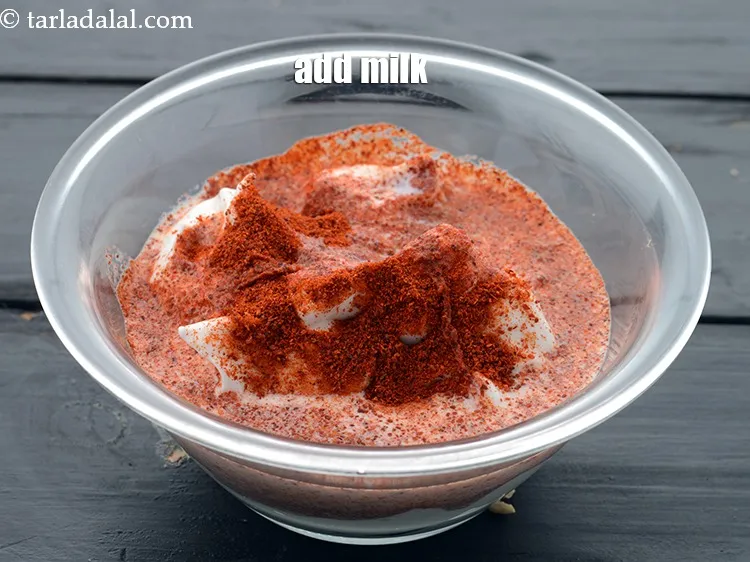 Step 17 – Add 1/2 cup&nbsp;<a href="https://www.tarladalal.com/glossary-milk-doodh-full-cream-milk-514i">milk</a>.&nbsp;