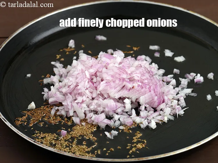 Step 17 – Add 1/2 cup finely&nbsp;<a href="https://tarladalal.com/glossary-chopped-onions-722i">chopped onions</a>.