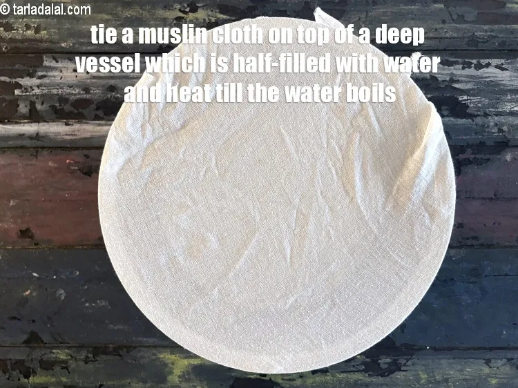 Step 22 – Tie a muslin cloth on top of a deep vessel, which is half-filled with water …