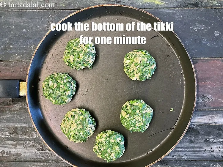 Step 33 – Cook the bottom of the tikki for about one minute on medium heat.