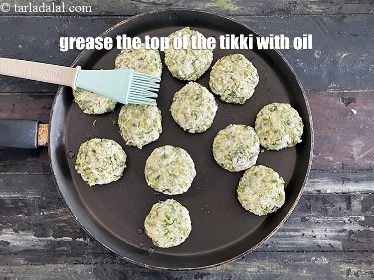 Step 18 – <html><head><meta charset="UTF-8"></head><body><p>Grease the top of the tikki.&nbsp;&nbsp;</p></body></html>