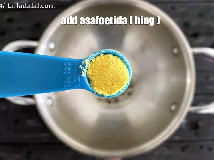 Step 17 – Add&nbsp;<meta charset="UTF-8" />1/4 tsp&nbsp;<a href="glossary-asafoetida-hing-113i">asafoetida (hing)</a>.