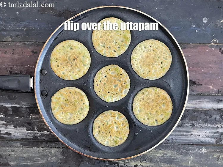 Step 29 – Flip over the uttpam.