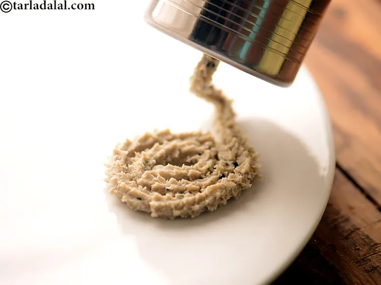 Step 7 – The size of the chakli can be your choice. Just ensure that the spirals are …