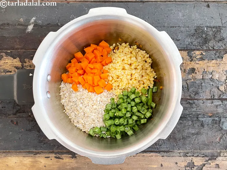 Step 33 – Add&nbsp;<meta charset="UTF-8" />1/4 cup&nbsp;<a href="glossary-chopped-french-beans-797i">chopped french beans</a>.&nbsp;French Beans&nbsp;is rich in&nbsp;<a href="https://www.tarladalal.com/recipes-for-Pregnancy-Folic-Acid-Rich-447" target="_blank">folic acid</a>. &nbsp;A deficiency …