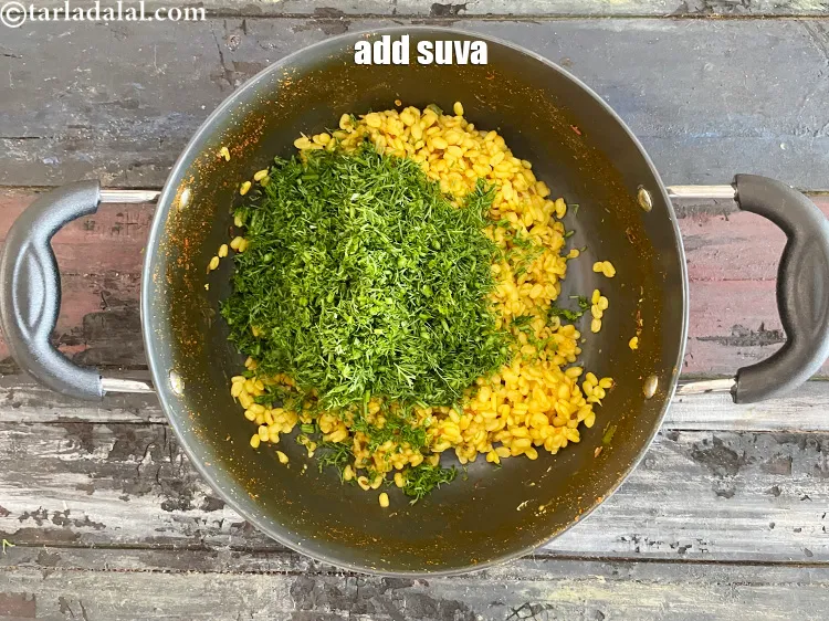 Step 29 – Add&nbsp;<meta charset="UTF-8" />1 1/2 cups&nbsp;<a href="glossary-chopped-dill-leaves-1849i">chopped dill leaves</a>.