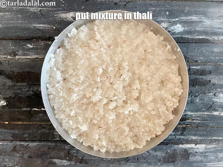 Step 28 – Put the coconut sugar mixture in the thali.