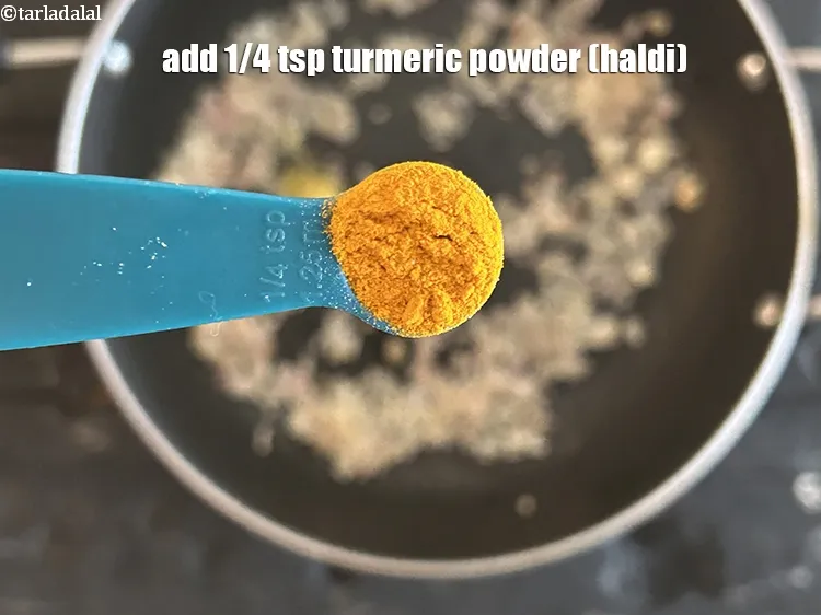 Step 19 – Add&nbsp;<meta charset="UTF-8" />1/4 tsp&nbsp;<a href="glossary-turmeric-powder-haldi-645i">turmeric powder (haldi)</a>.