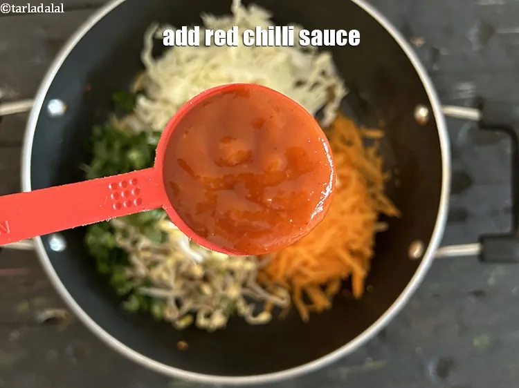 Step 18 – Add&nbsp;1 tbsp&nbsp;<a href="https://www.tarladalal.com/glossary-red-chilli-sauce-lal-chilli-sauce-810i">chilli sauce</a>&nbsp;or garlic sauce.